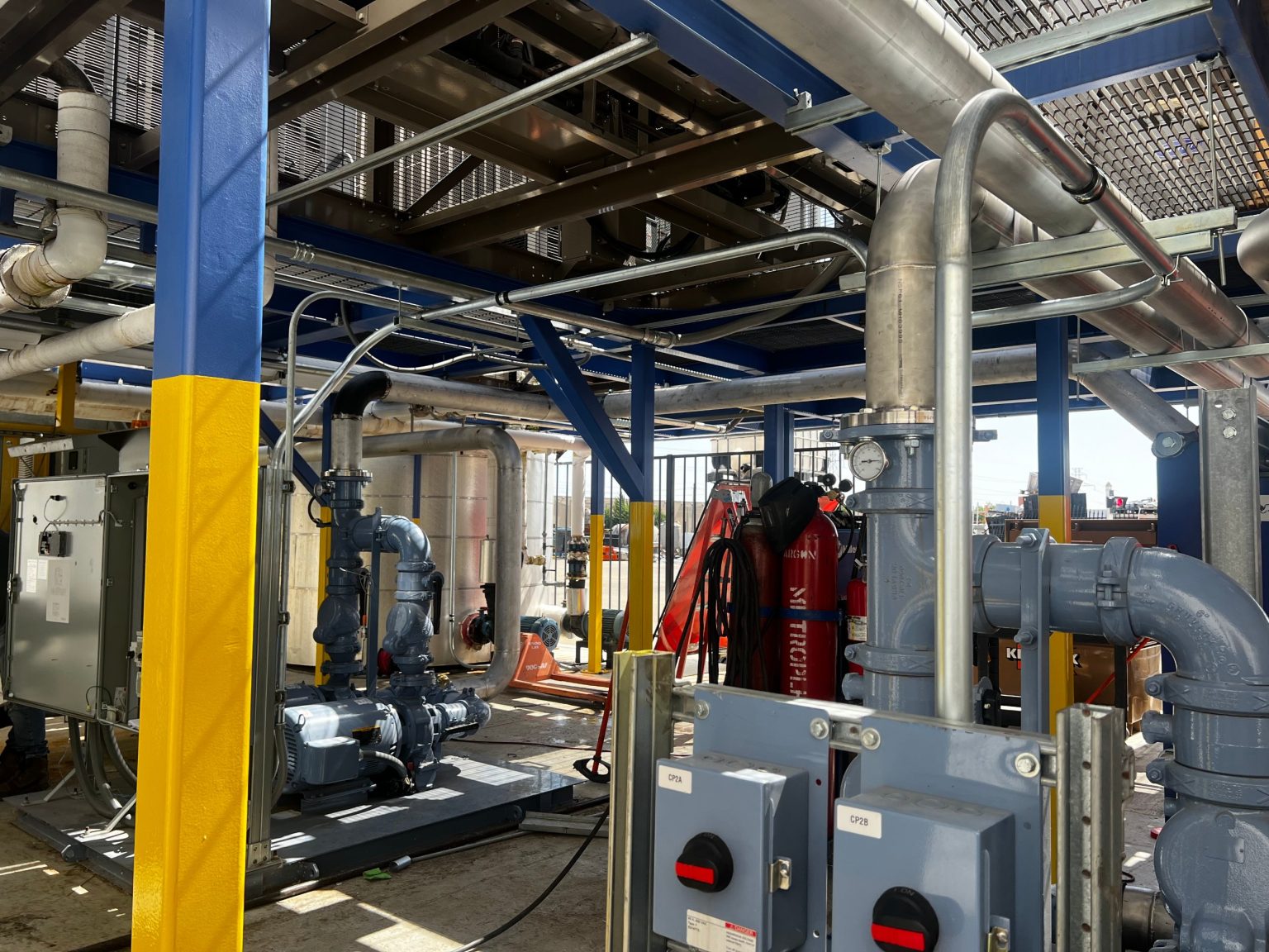 New chiller pump skid with piping, motors and disconnects